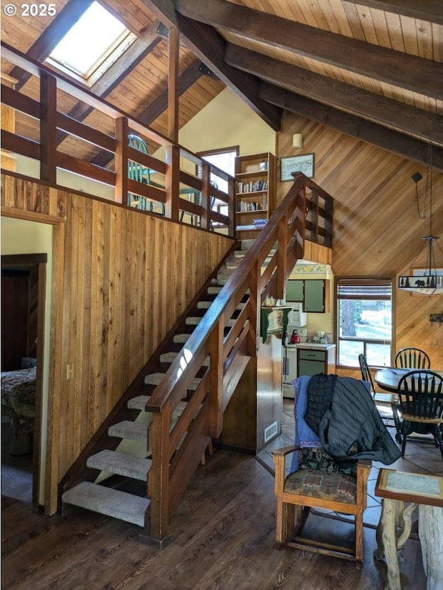 70710 Steeple Bush, Sisters, OR 97759 - stairs featuring wood walls, wood ceiling, wood finished floors, and a skylight