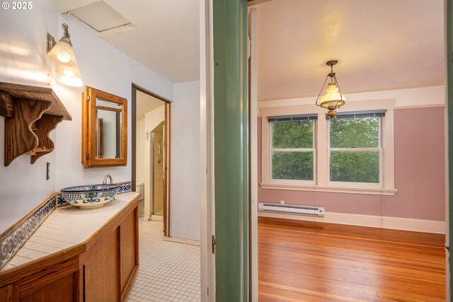 2822 Crocker Rd, Eugene, OR 97404 - bathroom with a baseboard radiator and wood finished floors