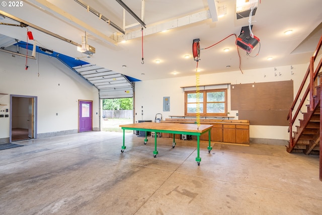 2822 Crocker Rd, Eugene, OR 97404 - game room featuring a garage, electric panel, and concrete flooring