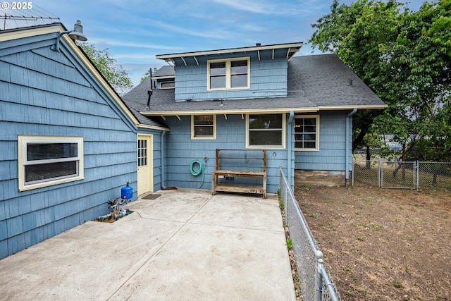 2822 Crocker Rd, Eugene, OR 97404 - back of house with roof with shingles, a patio area, and a gate