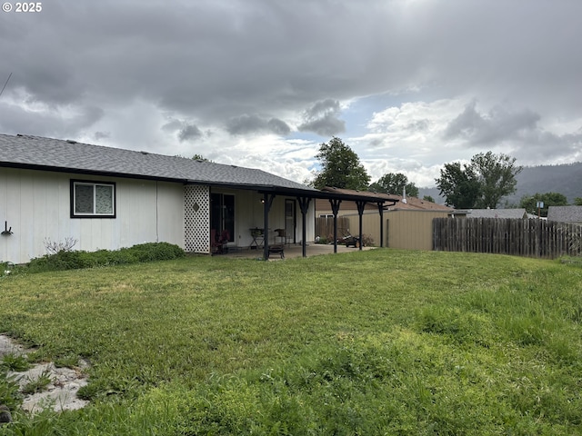 145 Donald Ter, Myrtle Creek, OR 97457 - rear view of house featuring a patio area