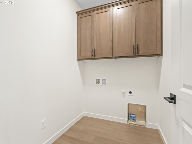 17019 NE 82nd St, Vancouver, WA 98682 - washroom with washer hookup, light wood-style floors, baseboards, cabinet space, and electric dryer hookup