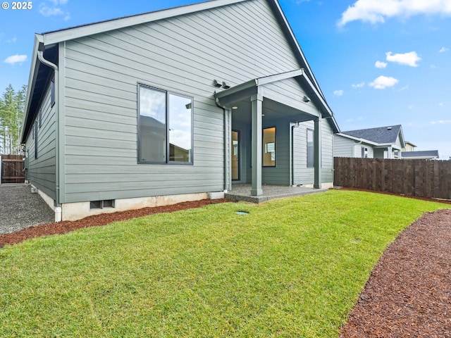 17019 NE 82nd St, Vancouver, WA 98682 - rear view of house featuring a patio area, fence, and a lawn
