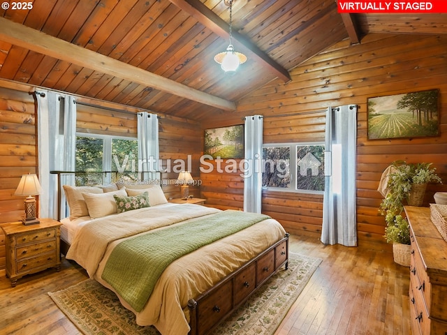 bedroom featuring wood ceiling, light hardwood / wood-style flooring, lofted ceiling with beams, and wood walls