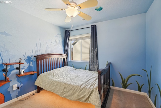 bedroom with carpet flooring, lofted ceiling, a ceiling fan, baseboards, and a textured ceiling
