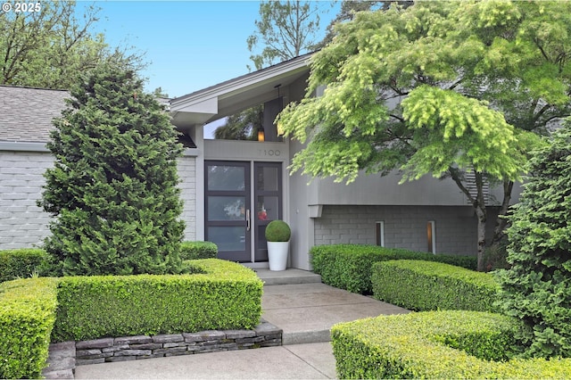7100 SW Willowmere Dr, Portland, OR 97225 - view of front of house with brick siding