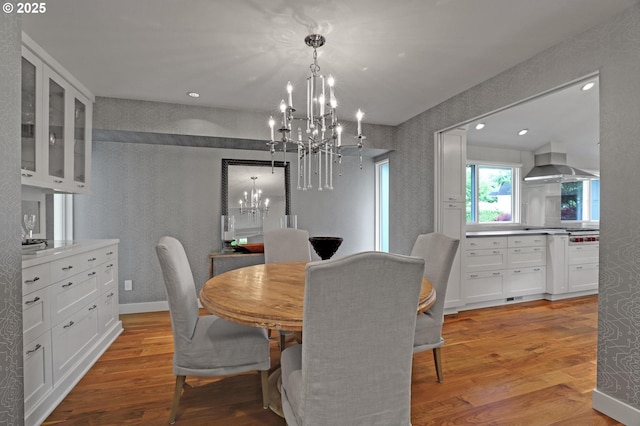 7100 SW Willowmere Dr, Portland, OR 97225 - dining room featuring a chandelier, light wood-style floors, and recessed lighting