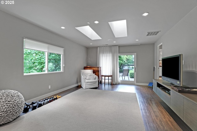 7100 SW Willowmere Dr, Portland, OR 97225 - sitting room with dark wood-style floors, a skylight, baseboards, and recessed lighting