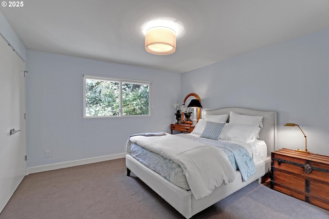 7100 SW Willowmere Dr, Portland, OR 97225 - carpeted bedroom featuring baseboards