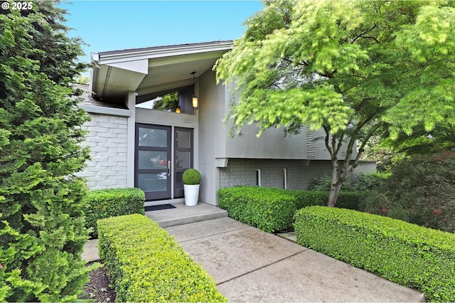 7100 SW Willowmere Dr, Portland, OR 97225 - property entrance with brick siding