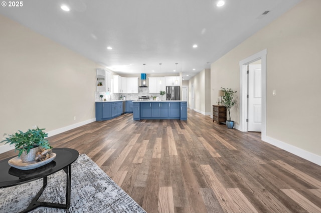 unfurnished living room featuring dark hardwood / wood-style flooring