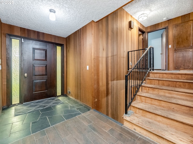 entrance foyer with wooden walls