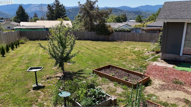 715 Penny Ln, Riddle, OR 97469 - view of yard with a garden and a mountain view