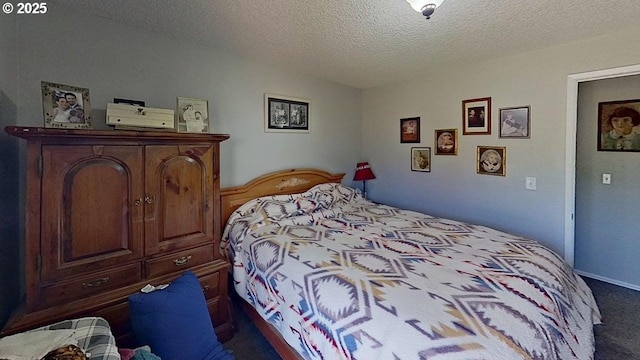 715 Penny Ln, Riddle, OR 97469 - bedroom with dark colored carpet and a textured ceiling