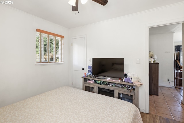 1510 W 10th St, The Dalles, OR 97058 - bedroom with crown molding, wood finished floors, and ceiling fan