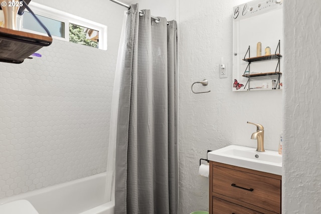 1510 W 10th St, The Dalles, OR 97058 - bathroom with shower / tub combo, vanity, and a textured wall