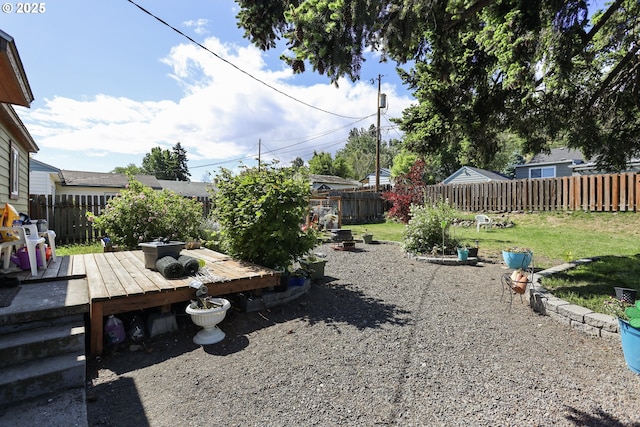 1510 W 10th St, The Dalles, OR 97058 - fenced backyard featuring a deck
