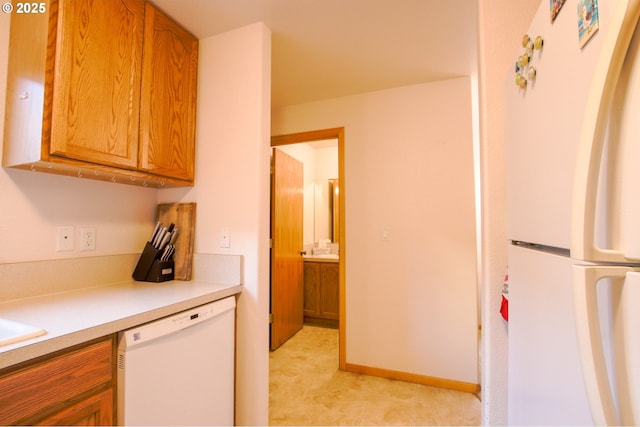 kitchen featuring white appliances