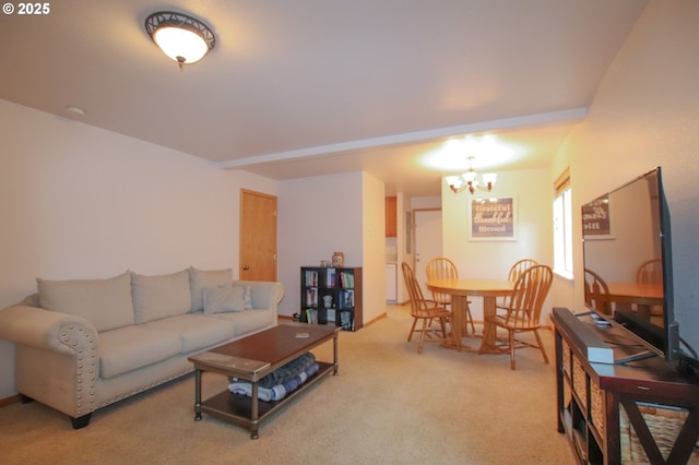 carpeted living room with beam ceiling and a notable chandelier