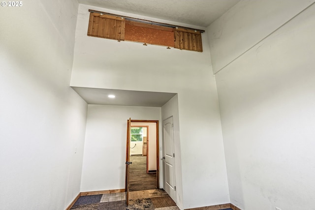 151 Owl Creek Rd, Kelso, WA 98626 - interior space featuring baseboards, a high ceiling, and wood finished floors