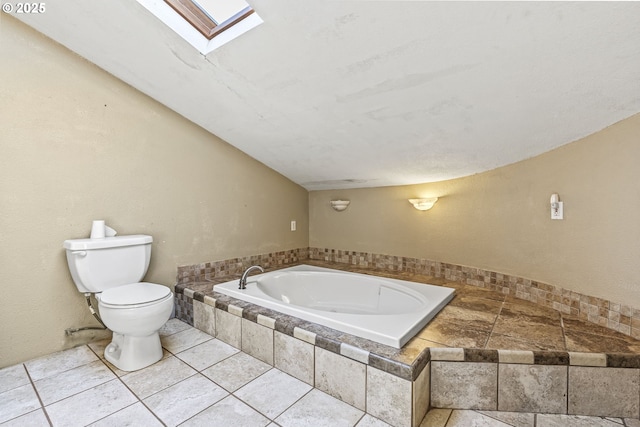 151 Owl Creek Rd, Kelso, WA 98626 - bathroom with toilet, a skylight, and a bath