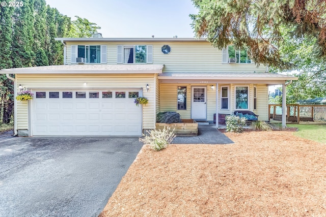 13503 NE 80th Cir, Vancouver, WA 98682 - view of front of property featuring driveway, a garage, covered porch, and a chimney