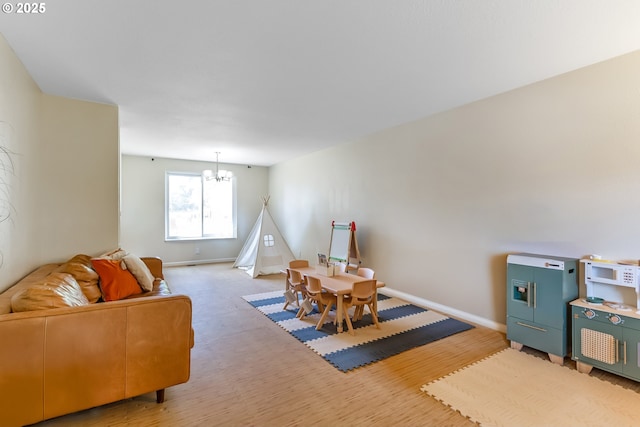 13503 NE 80th Cir, Vancouver, WA 98682 - playroom featuring a chandelier and baseboards