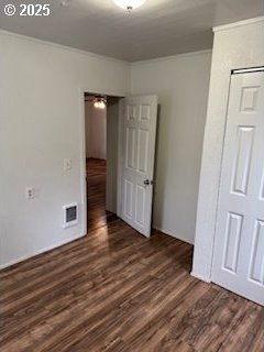 full bath with wood finished floors, a shower stall, and vanity