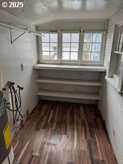 details with visible vents, baseboards, and wood finished floors