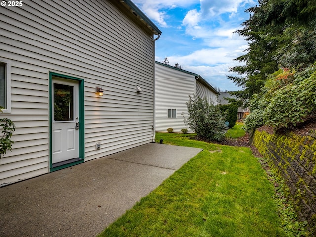 exterior space with a patio, fence, and a yard