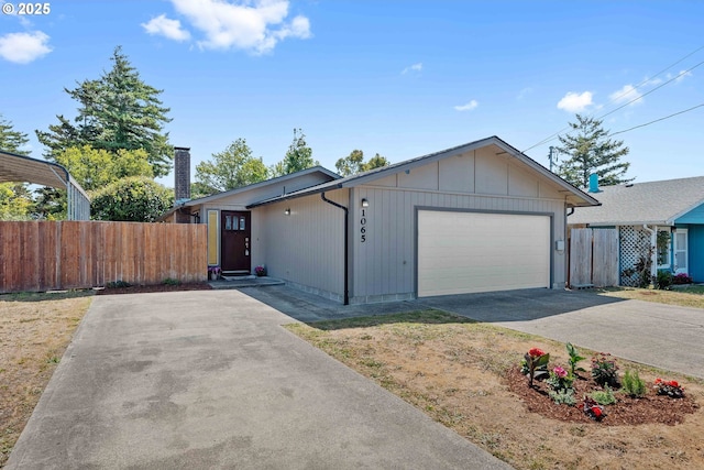 1065 Fenwick St, Coos Bay, OR 97420 - view of front of property featuring driveway and a garage