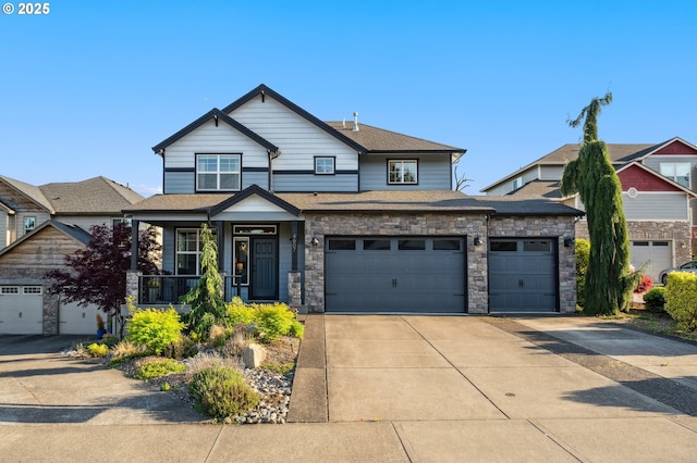 craftsman-style home featuring concrete driveway, a porch, stone siding, and a garage