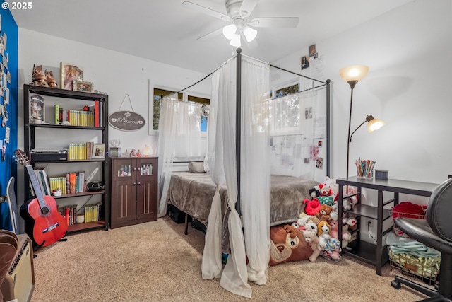 carpeted bedroom with ceiling fan