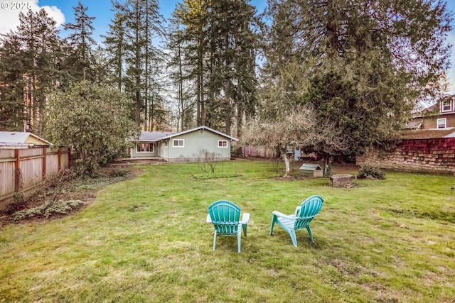 view of yard with fence