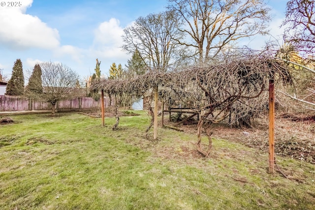 view of yard featuring fence