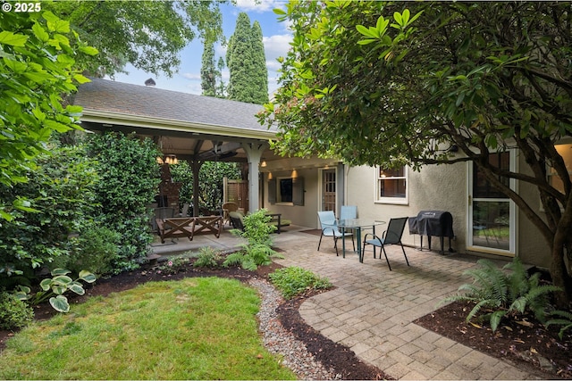 7150 SE 27th Ave, Portland, OR 97202 - back of house with a patio and stucco siding