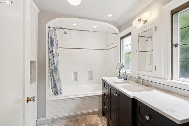 7150 SE 27th Ave, Portland, OR 97202 - full bathroom with vanity, tiled shower / bath, plenty of natural light, and recessed lighting