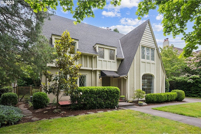 7150 SE 27th Ave, Portland, OR 97202 - english style home featuring a shingled roof and stucco siding