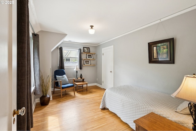 7150 SE 27th Ave, Portland, OR 97202 - bedroom with light wood-style flooring and baseboards