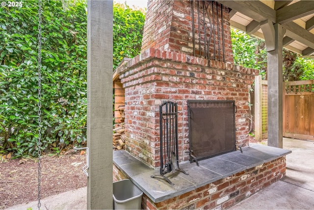 7150 SE 27th Ave, Portland, OR 97202 - view of patio / terrace with an outdoor brick fireplace