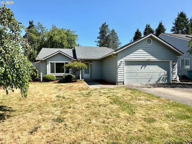 4120 NE 52nd St, Vancouver, WA 98661 - ranch-style home with a garage, asphalt driveway, and a front yard