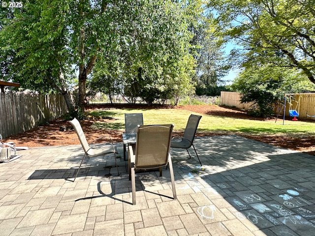 4120 NE 52nd St, Vancouver, WA 98661 - fenced backyard featuring outdoor dining space and a patio area