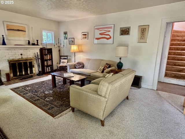 991 Polk St, Eugene, OR 97402 - carpeted living room featuring a textured ceiling and a brick fireplace