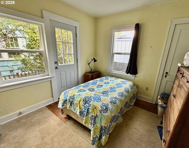 991 Polk St, Eugene, OR 97402 - bedroom with baseboards and wood finished floors