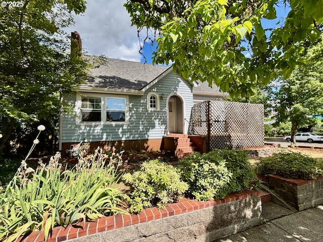 991 Polk St, Eugene, OR 97402 - view of front of house featuring a shingled roof and a garage