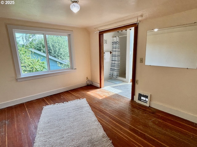 991 Polk St, Eugene, OR 97402 - spare room with baseboards and hardwood / wood-style flooring