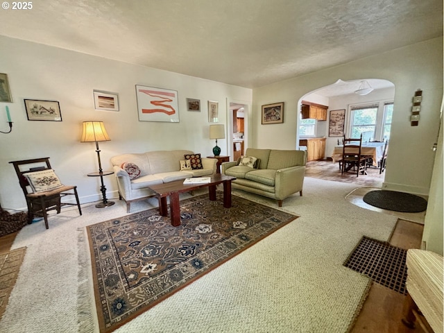 991 Polk St, Eugene, OR 97402 - carpeted living area with arched walkways