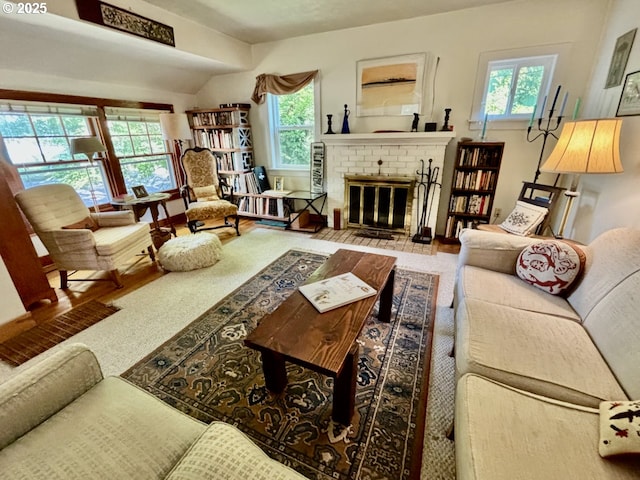991 Polk St, Eugene, OR 97402 - living area featuring healthy amount of natural light and a brick fireplace