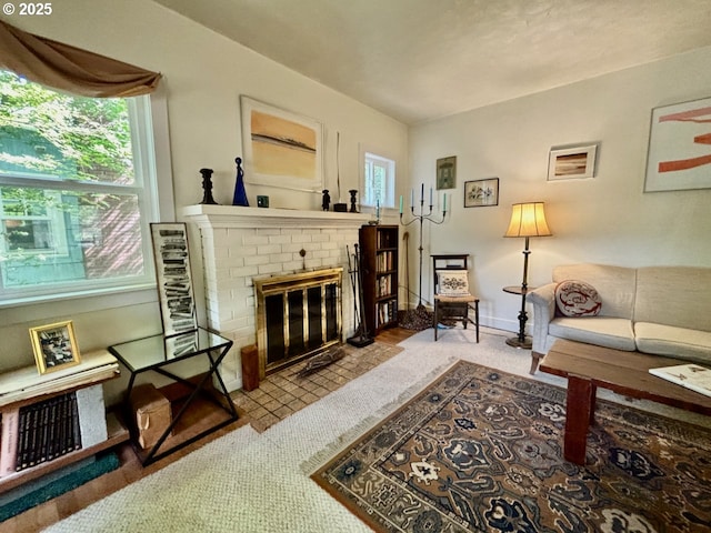 991 Polk St, Eugene, OR 97402 - living area featuring a fireplace and baseboards