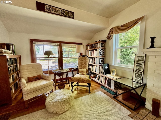 991 Polk St, Eugene, OR 97402 - sitting room featuring lofted ceiling and wood finished floors